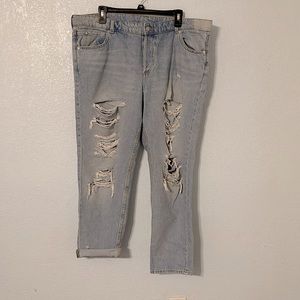 Low rise ripped boyfriend jeans. Size 16